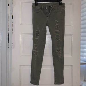 Distressed army green jeans